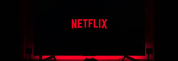 Why is Netflix stock beating the broader market today?