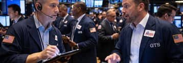 Dow rises while Nasdaq slides on oil surge, Treasury yields pressure tech