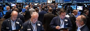 Dow jumps 230 points as chip stocks rebound ahead of Big Tech earnings