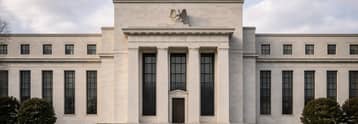 Fed houdt rente ongewijzigd; beleidsmakers verdeeld over renteverhogingen onder Warsh