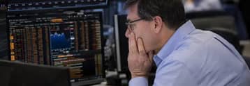 UK equities hover at three-week lows as investors assess global risks