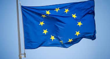 European shares traded near-record high in thin holiday trade.