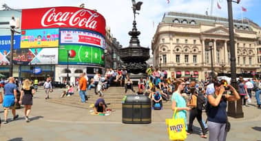 Coca Cola says its newly launched products helped fuel sales in the fourth quarter