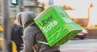 El precio de las acciones de Grubhub sube vertiginosamente en las negociaciones de la adquisición de Uber.