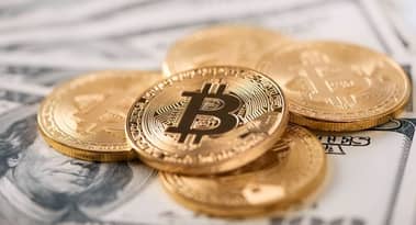 Bitcoin (BTC) al rialzo con quasi 100.000 monete bloccate nella DeFi