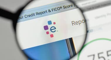 Experian says its pre-tax profit slid to £345.46 million in the fiscal first half