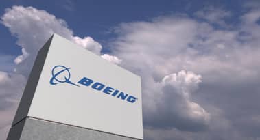 Baird reiterates a "Buy" rating for Boeing while two traders call for caution