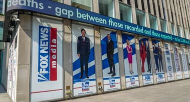 Why was Tucker Carlson fired and what was he worth to Fox Corp?