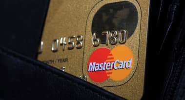 Should you buy Mastercard shares as they trade at record-high levels?