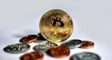Cryptocurrency prices tumble as Asian futures point lower