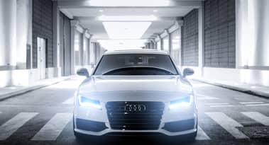 Audi factory closure plans spark protest by over 5,000 workers near European Parliament