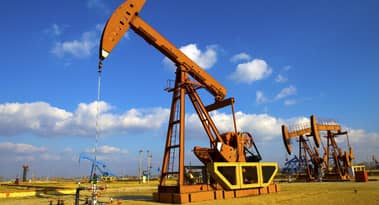 Crude oil prices hover around $71 per barrel amid dovish Fed signals