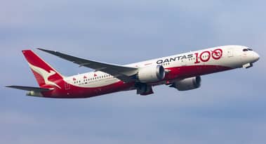 Qantas shares hit record high on frequent flyer program changes: analysts see QAN stock flying further
