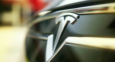 Tesla (TSLA) drops after BofA downgrade, but bulls remain optimistic: what investors need to know