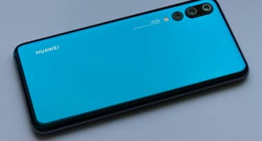 Huawei defies US sanctions, reports $118 billion in revenue