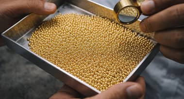 Gold prices drop on Iran peace talk hopes, firm dollar; downside limited