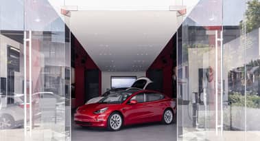 Why Tesla stock is down 1% despite reports of a new EV