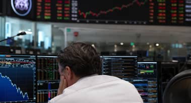 London’s FTSE 100 dips as utilities and miners drag index