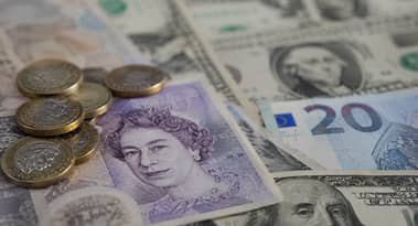 Sterling falls against dollar and euro as UK political tensions rise