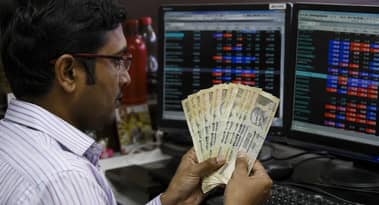 Rupee edges up as oil slips, markets eye US-Iran talks