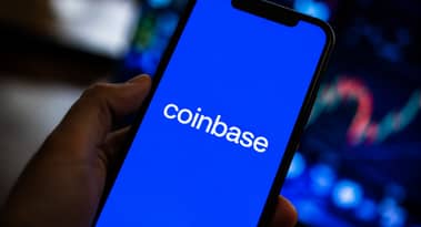 Coinbase stock falls as Baird flags weak trading volumes and valuation risks
